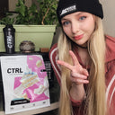 Ashtronova next to a bag of CTRL Birthday Cake.